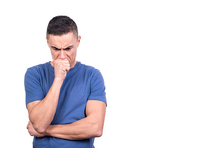 Man with his hand on his face while thinking serious, a Background Photo by Iván Moreno STOCK PHOTO
