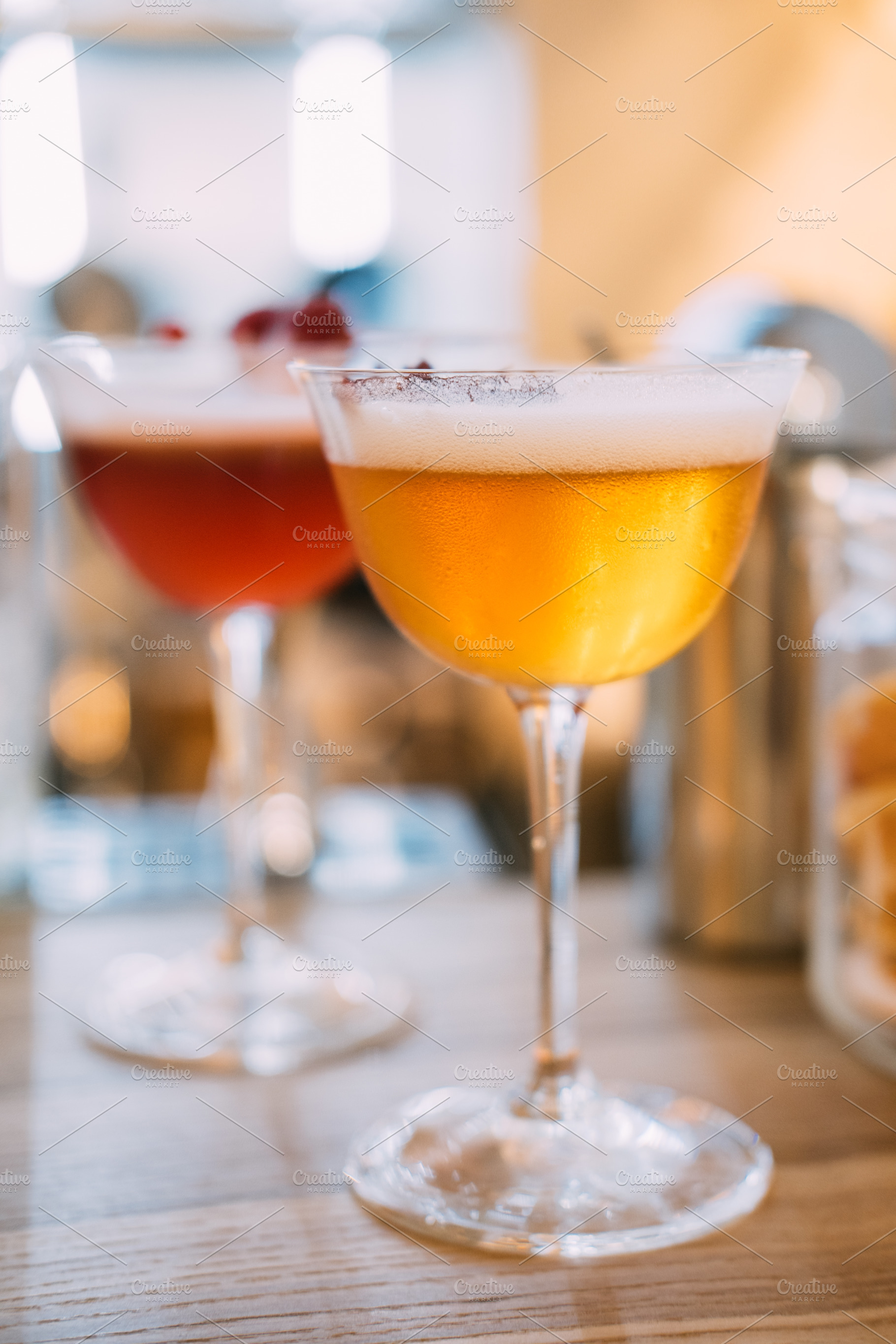 Frothy cocktail aperitif glass mixed drink tray, a Food & Drink Photo by Photo Drive Studio