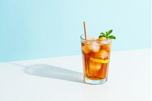 Summer cold drink on colored
