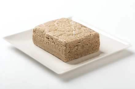 Vegetable-based halva sweet prepared from seeds on white, a Food & Drink Photo by zakiroff