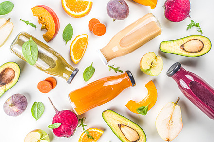 Various bottle fruit and vegetable s containing smoothie, juice, and summer, a Food & Drink Photo by Rimma