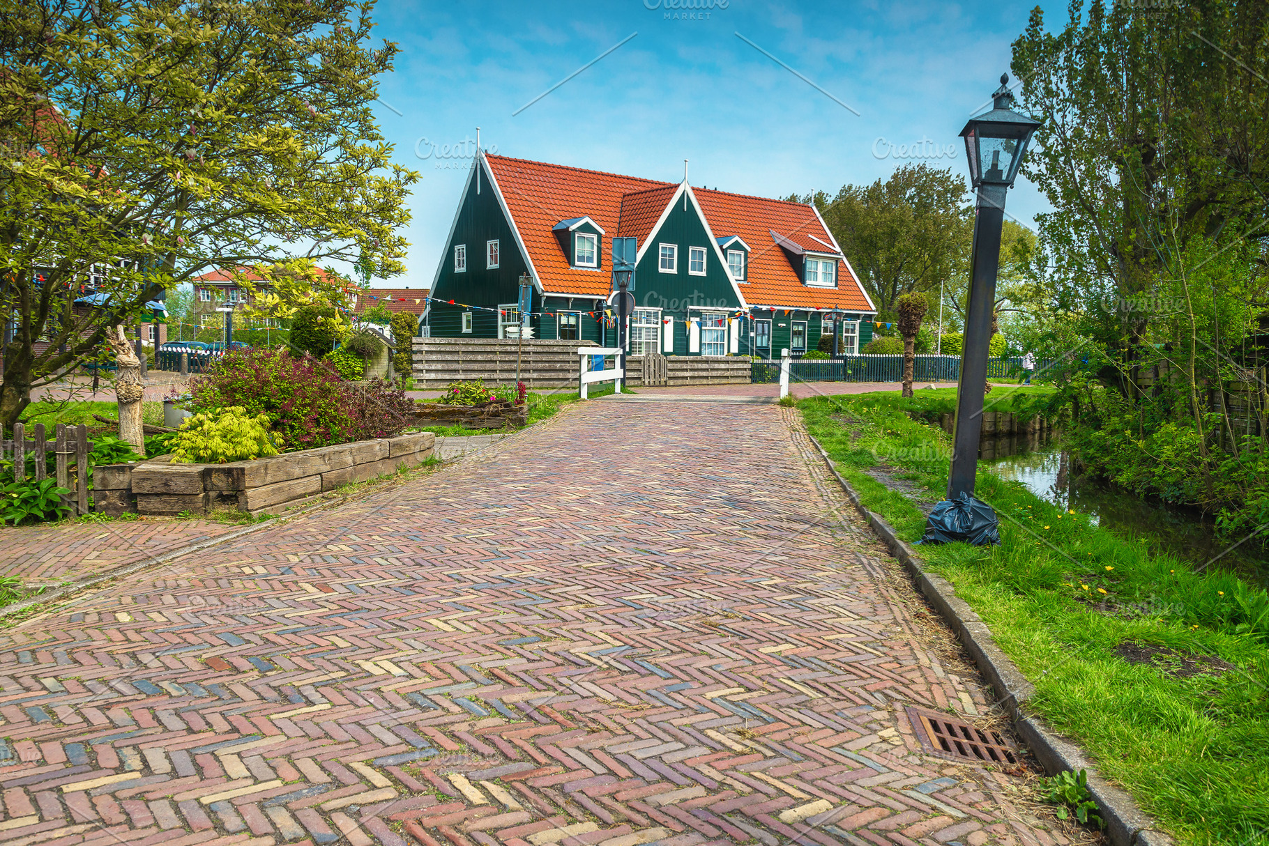 Cute walkway and small water channel, an Architecture Photo by Alpine Dreams