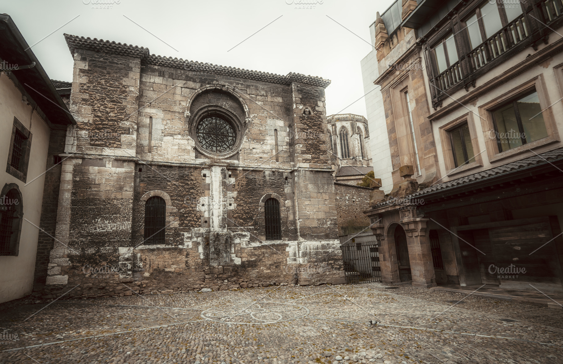 Old stone church facade, an Architecture Photo by SkyNext