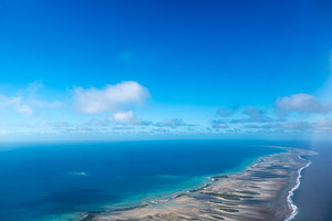 Aerial view of a motu in Tikehau Atoll, French Polynesia, a Photo by GoodGoods