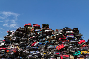 Stacked cars at a junkyard featuring amsterdam, car, and netherlands