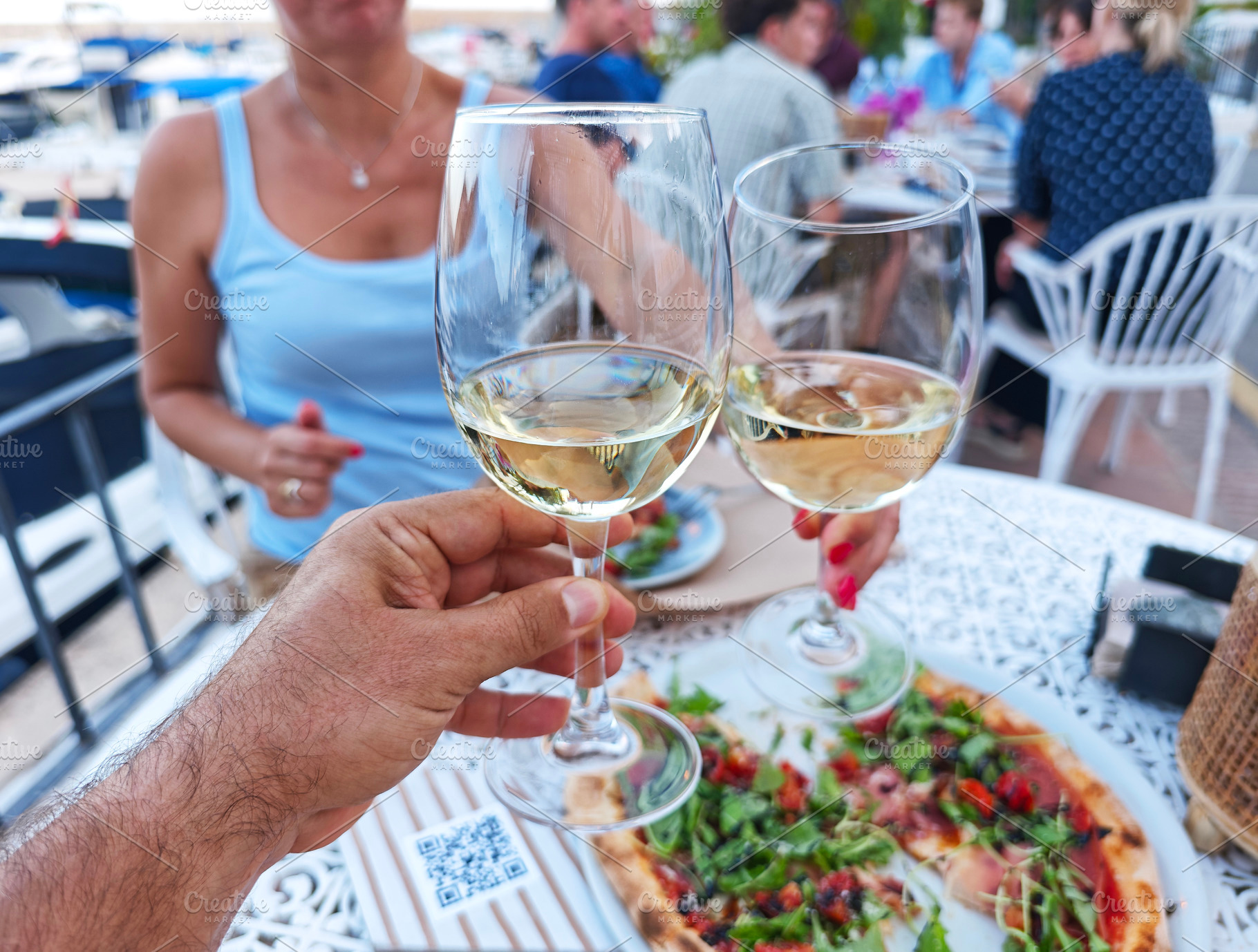 Outdoor dining scene with wine, a Food & Drink Photo by Volff