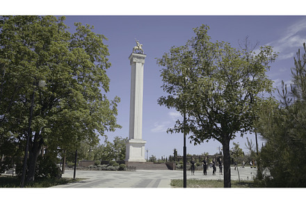 Tourists walk in city park with, an Architecture Photo by Media Whale Stock