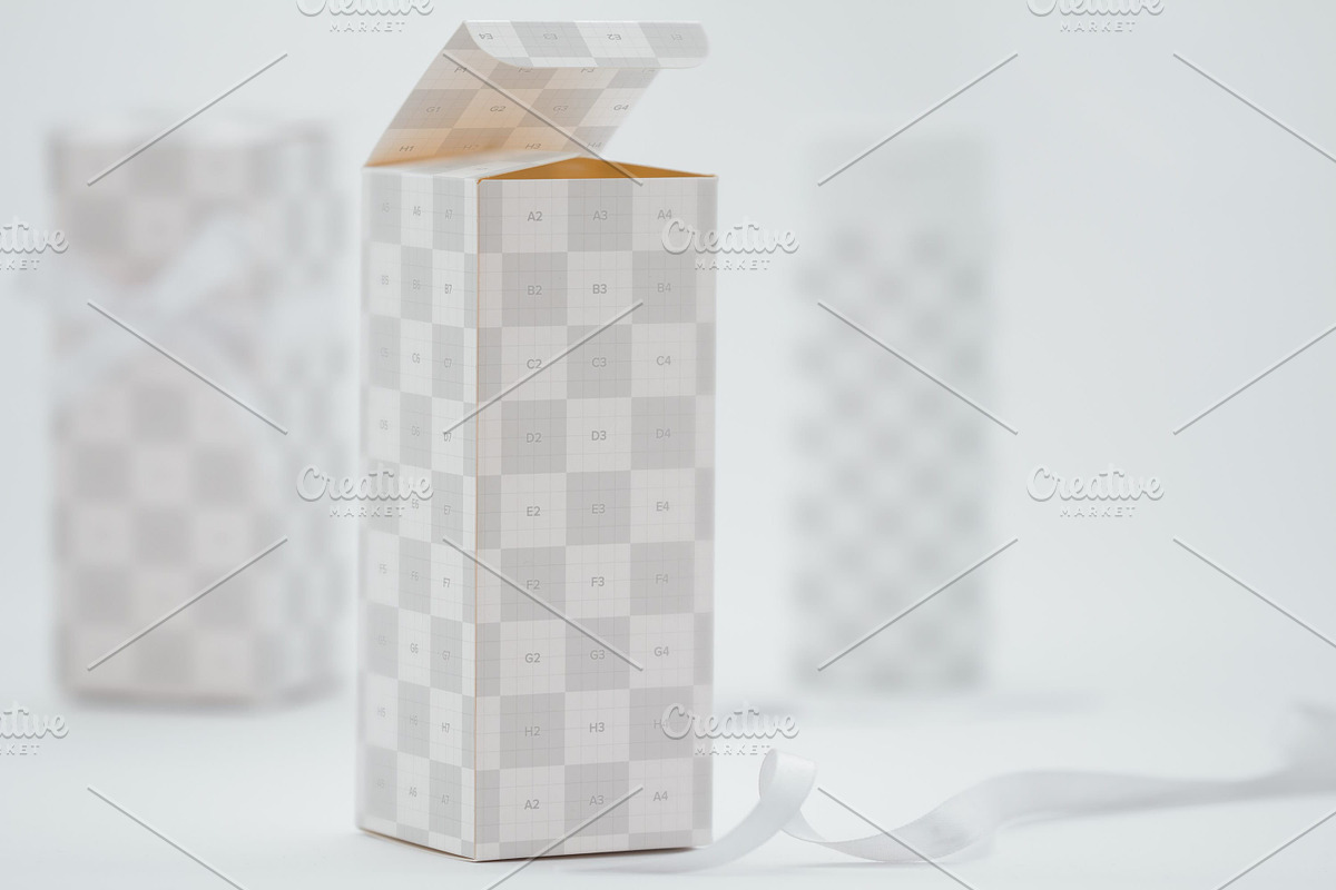 Tall Gift Box Mockup 03, a Packaging Mockup by Ktyellow (Photo 2 of 2)