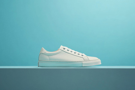 Pink sneakers on color background, a Photo by Dvoevnore photos