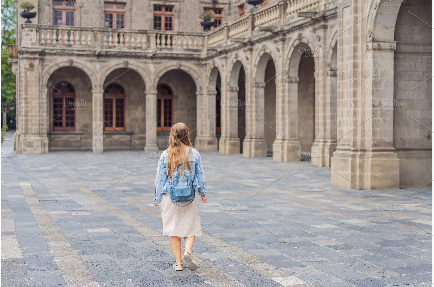 Young woman tourist standing near, an Architecture Photo by Elizaveta Galitskaya