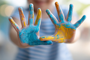 Child showing hands covered in color, a Person Photo by MistyDay