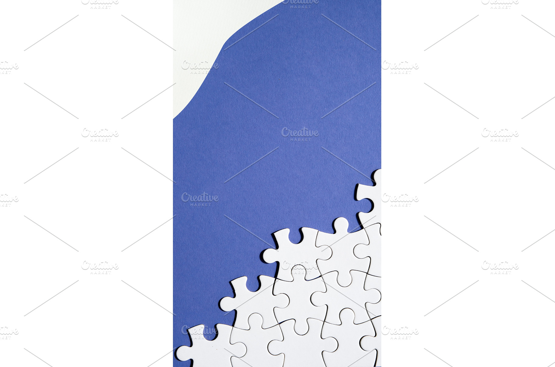 Jigsaw puzzle pieces half assembled, an Abstract Photo by tilialucida
