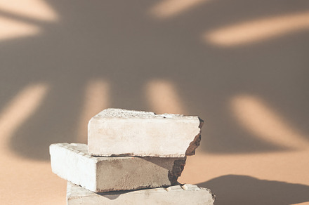 stone podium product display rock palm leaf shadow, a Nature Photo by Photo Drive Studio