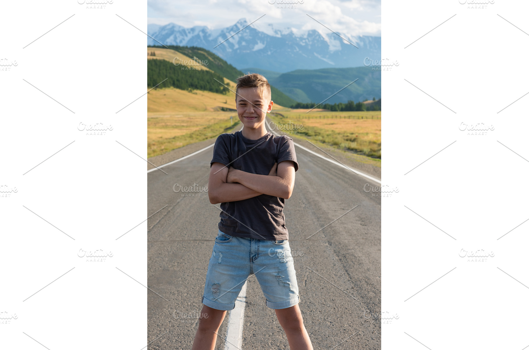 Smiling teen boy on the road in, a Person Photo by Jan Jack Russo Media