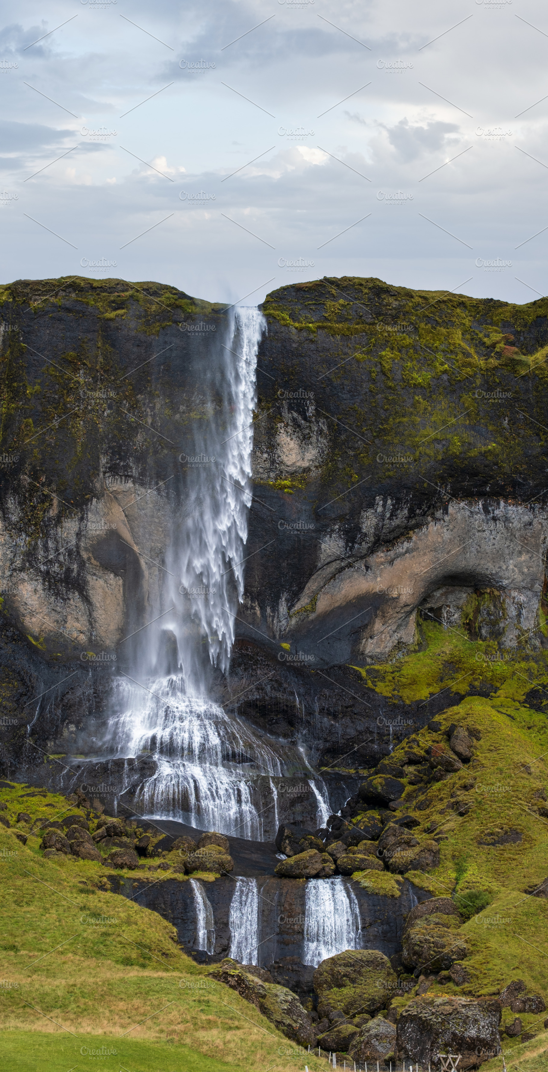 Waterfall view during auto trip in Iceland. Spectacular Icelandi, a Nature Photo by YuriyB