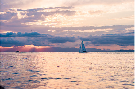 Beautiful sunset over sea with, a Nature Photo by Elizaveta Galitskaya