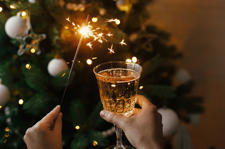 Celebrating with fireworks and drink