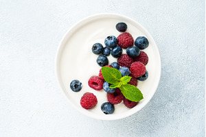 Yogurt with fresh berries in white, a Food & Drink Photo by Nadia-nb