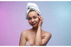 Woman applying under eye patches for, a Person Photo by volodymyrshtun13795