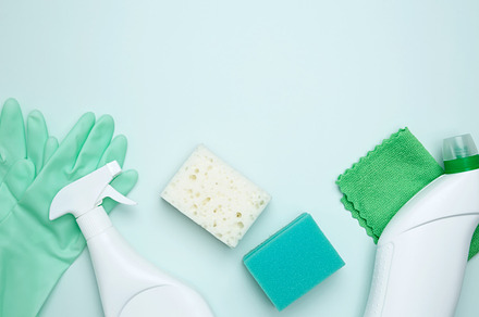 Concept of cleanliness and hygiene. Cleaning supplies and tools, including bott, a Photo by matucha