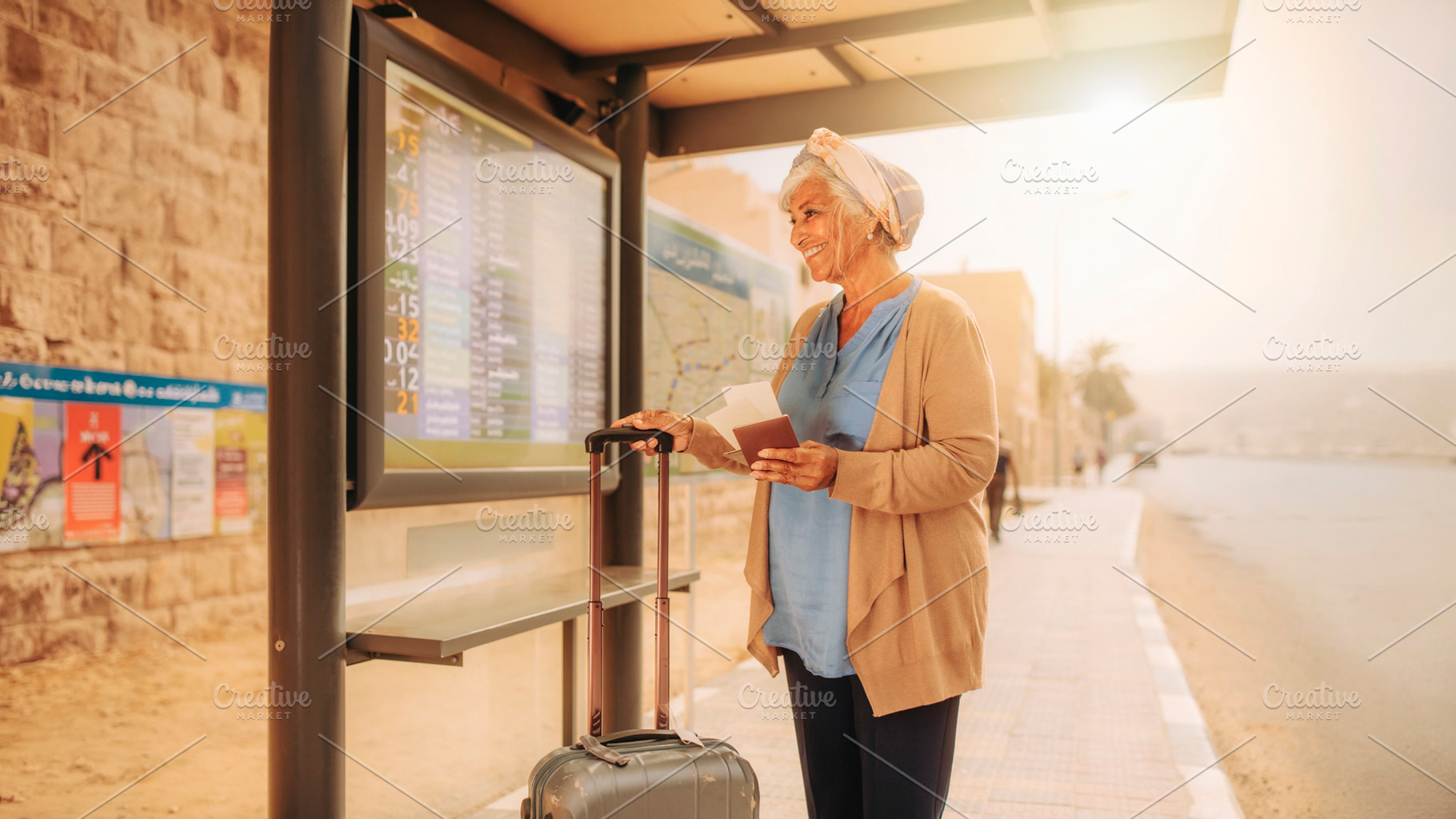 Senior woman waiting for public transportation, a Person Photo by DanFLCreativo