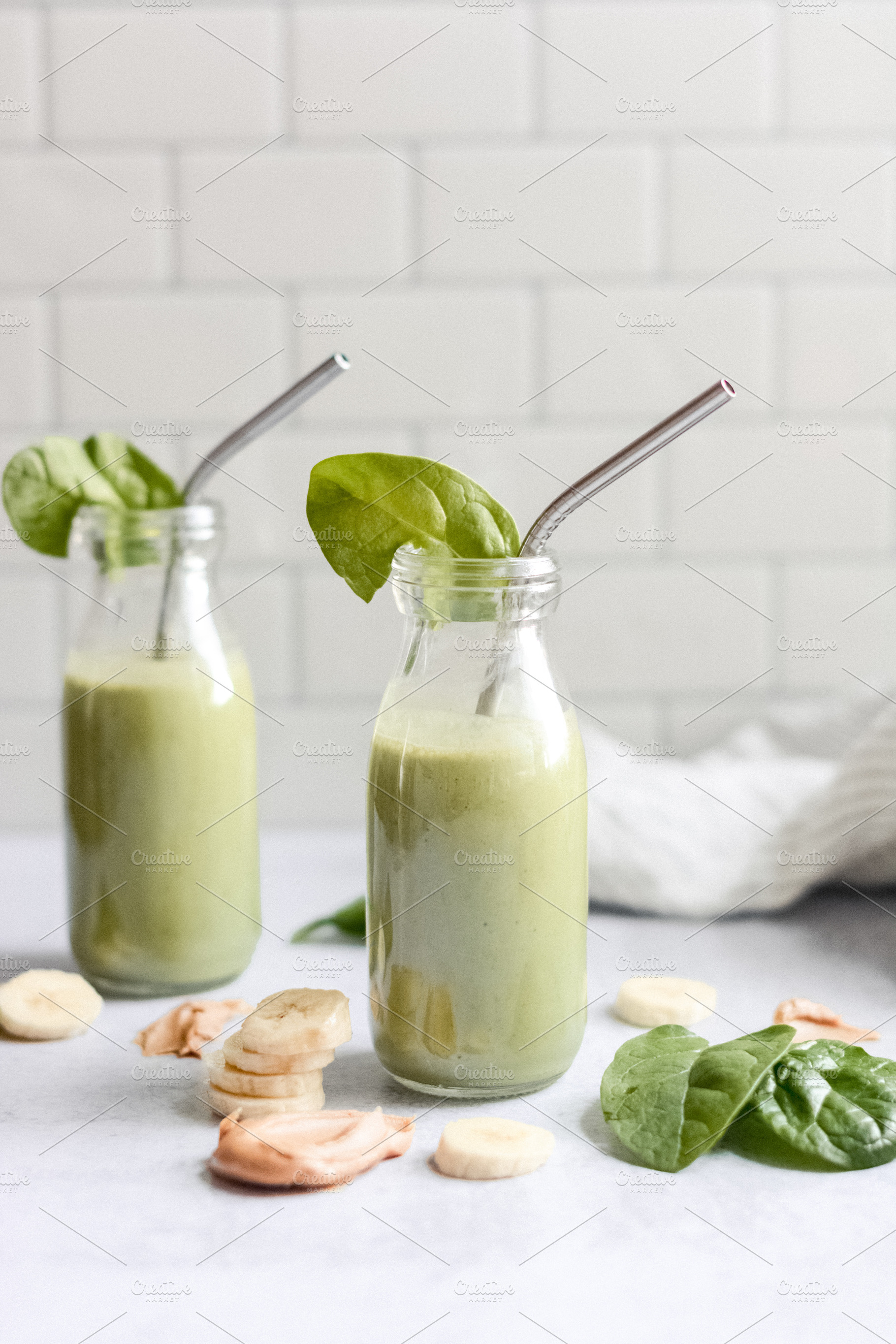 Green smoothies featuring green smoothies, breakfast smoothie, and spinach, a Food & Drink Photo by Stitch & Shutter Stock