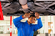 Mechanic fixing a lifted car featuring car, mechanic, and under, an Industrial Photo by Twinster Photo (Thumbnail 2 of 2)