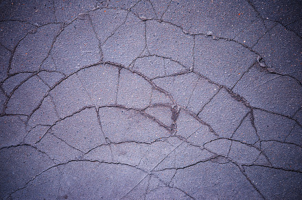 Cracked asphalt road texture background, an Abstract Photo by RETROWAVE '88