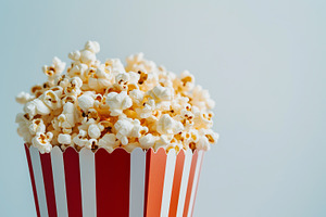 Popcorn in classic striped bucket, a Food & Drink Photo by MistyDay