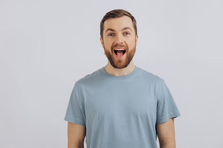 Portrait of a modern bearded middle-aged man in a blue t-shirt s, a Person Photo by Cherkas Photography