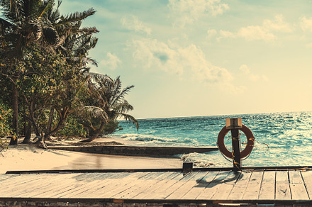 Wooden beach promenade on an island, a Nature Photo by SkyNext