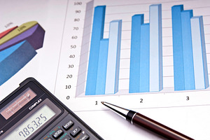 Bar Charts And Calculator, a Business Photo by THP Creative