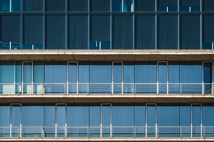 Urban minimalist architecture stock photo containing balconies and color, an Architecture Photo by Visual Motiv