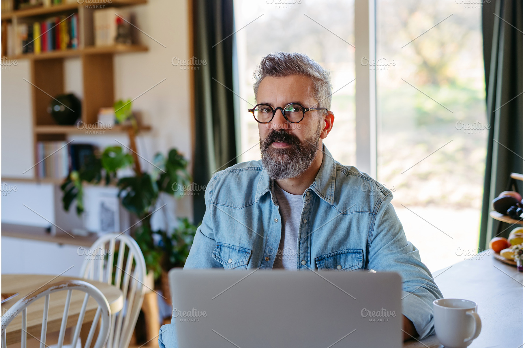 Man working from home office, a Person Photo by HalfPoint