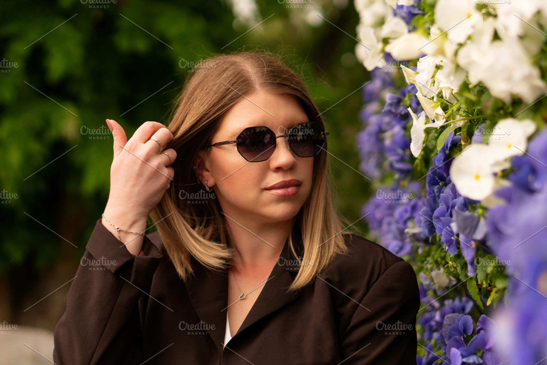Young stylish woman poses outdoors, a Person Photo by Elena Vagengeim