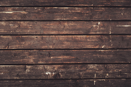 Aged wooden planks with rough texture and natural imperfections
