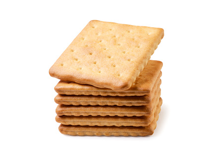 Cracker cookies lie in a stack close, a Food & Drink Photo by innakreativ