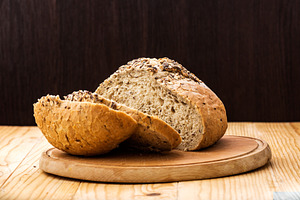 Loaf of wheat bread stock photo containing artisan and background
