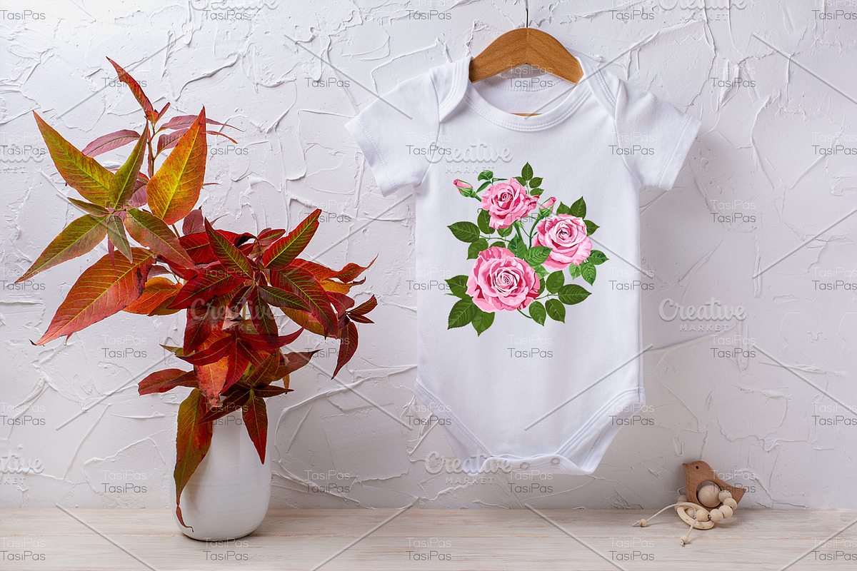 Baby bodysuit mockup with red grass, a Shirt Mockup by TasiPas (Photo 2 of 4)