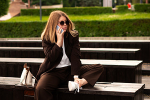 Young woman in brown suit, a Photo by Elena Vagengeim