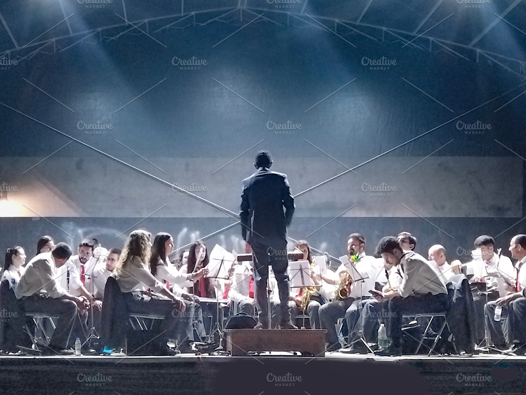 Youth symphony orchestra on stage, a Person Photo by DanFLCreativo