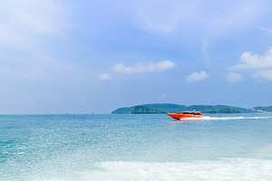 Speed boat containing krabi, phuket, and beautiful