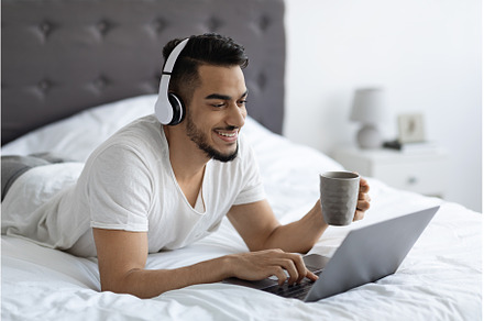 Middle Eastern Guy In Headphones, a Person Photo by Prostock-Studio