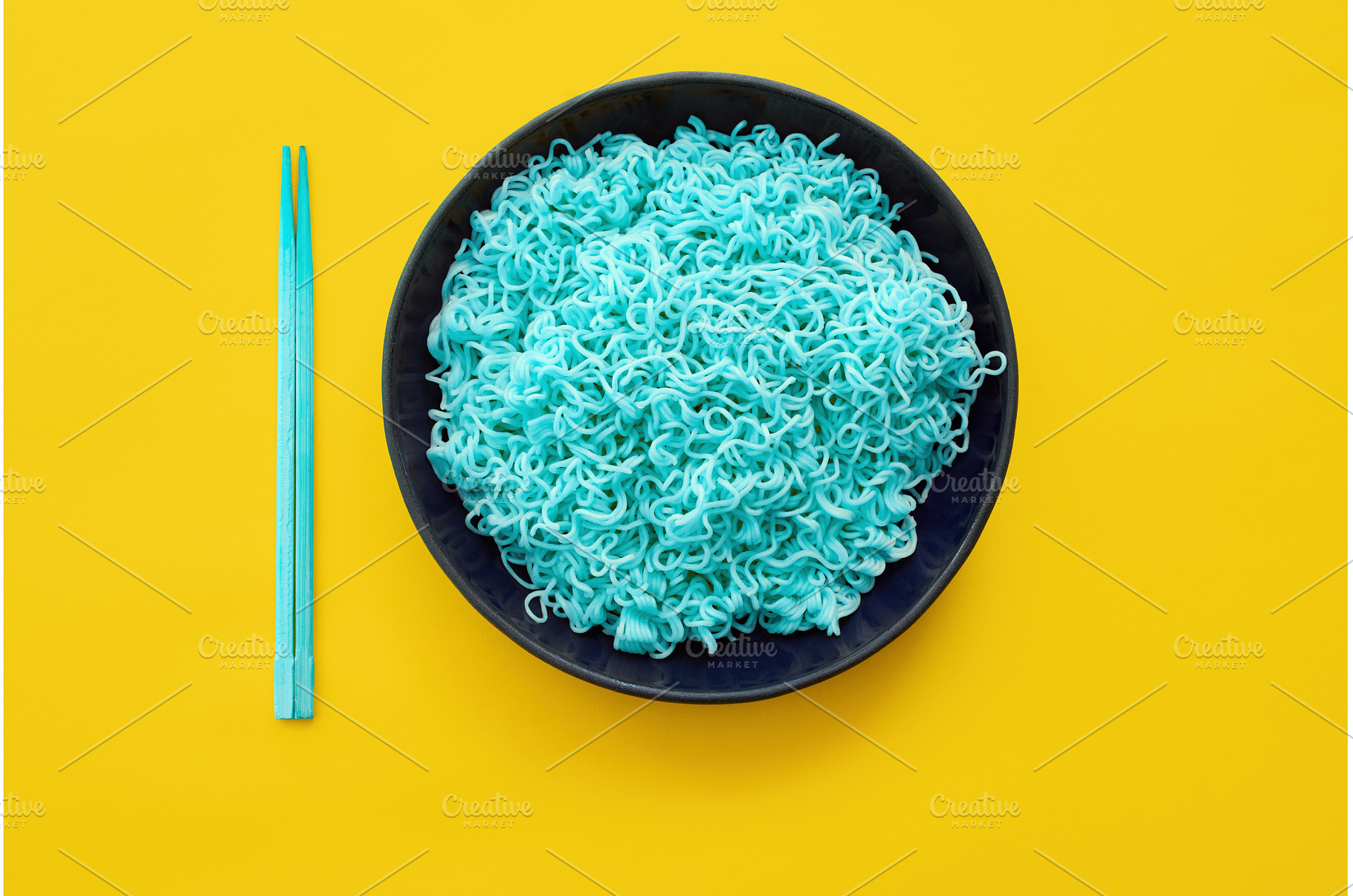 Bright blue noodles with chopsticks, a Food & Drink Photo by Gladkov photography