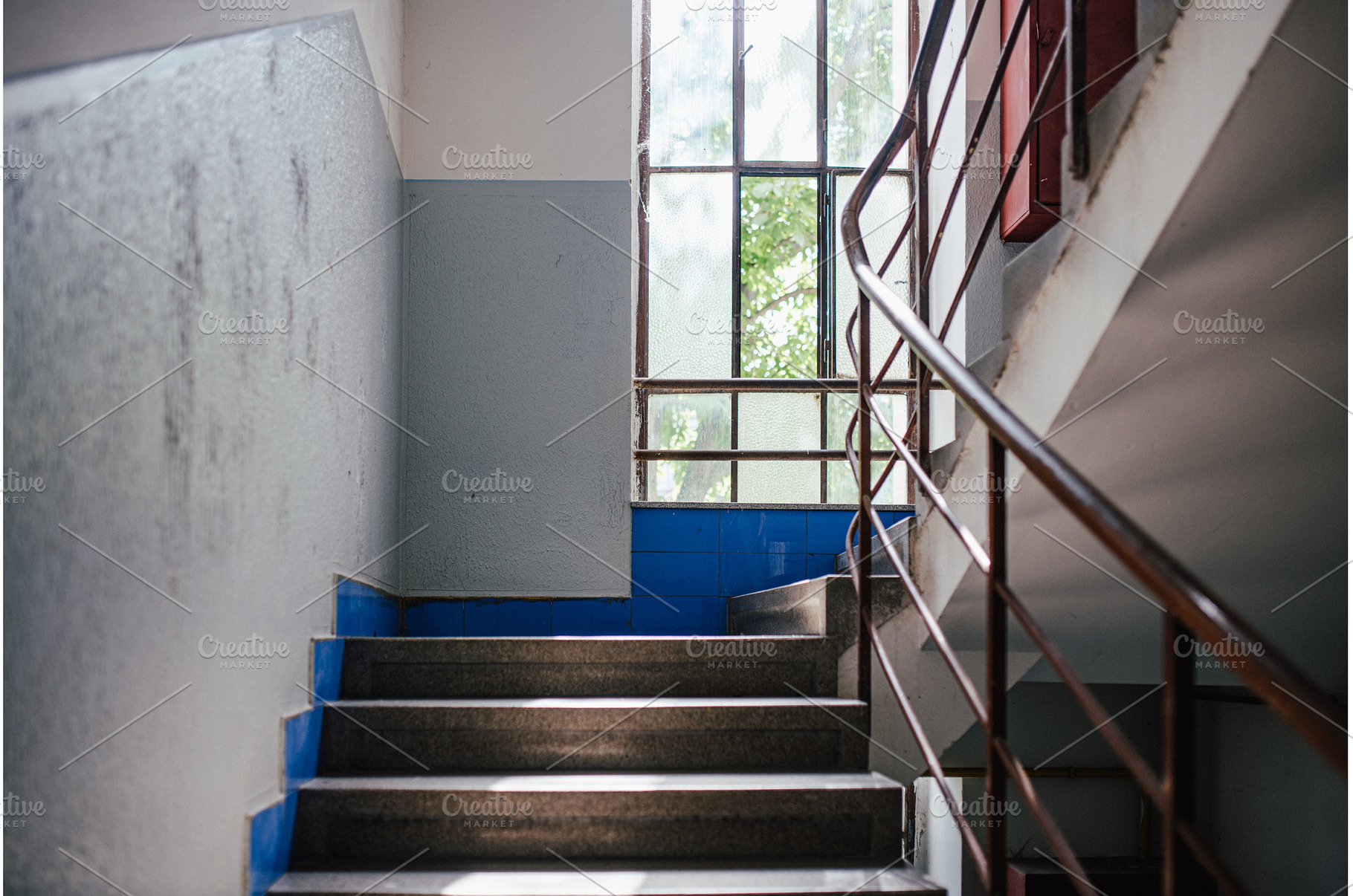 Old apartment building staircase, an Architecture Photo by HalfPoint