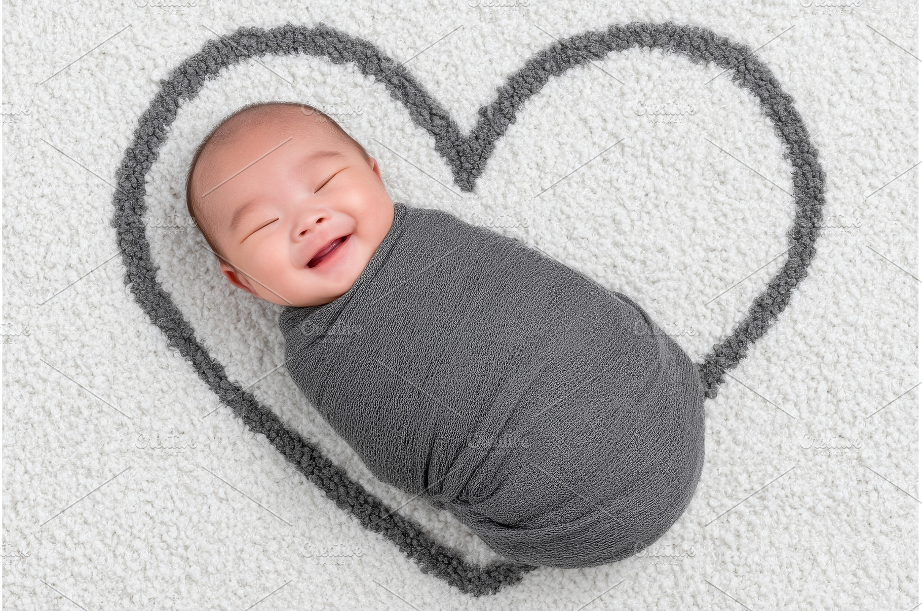 A newborn baby sleeps in its mother, a Person Photo by ZinetroN