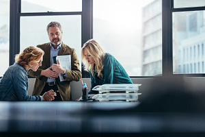 Business people discussing stock photo containing architect and architecture, a Business Photo by Jacob Lund