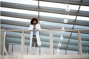 Portrait of doctor standing in, a Graphic by HalfPoint