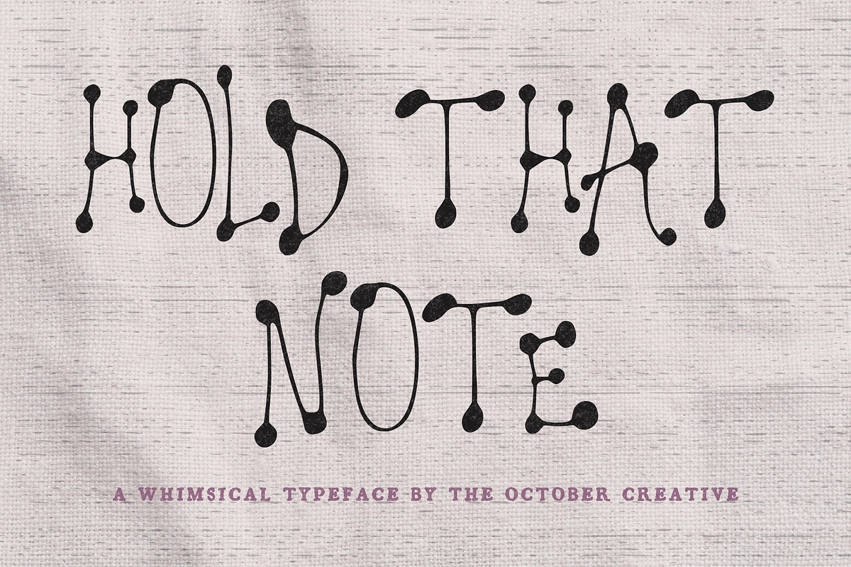 Hold That Note Dotted Display Font, a Handwritten Font by The October Creative (Photo 1 of 8)