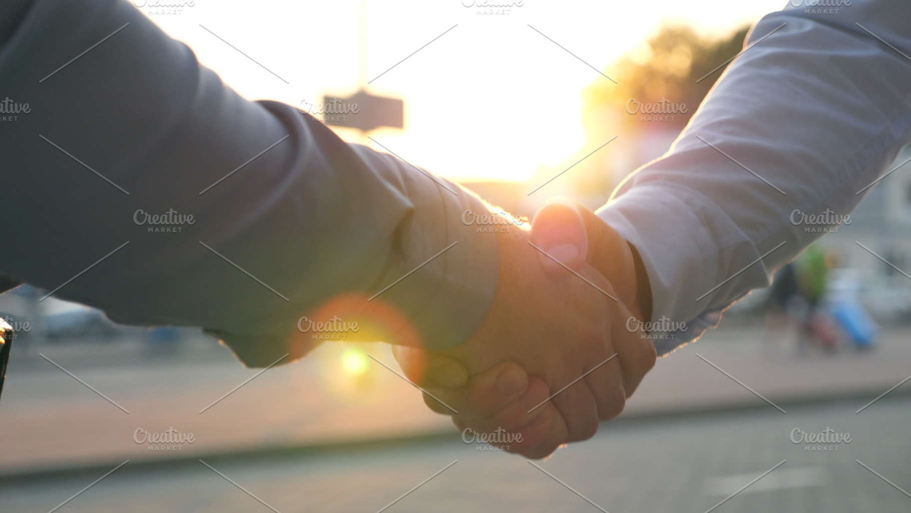 Close up of two successful stock photo containing agreement and arm, a Person Photo by Footage Autor